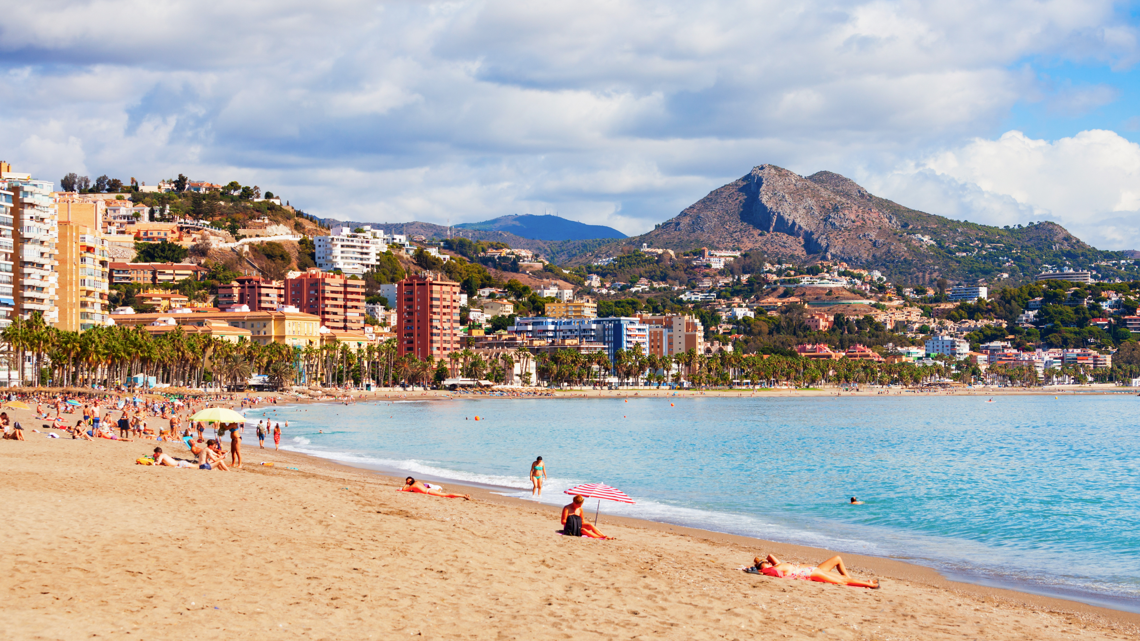 Digital nomad working from Malaga with city and coast lifestyle context